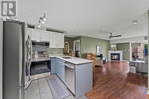 90 Murray Street Unit# 205, Amherstburg, ON - Indoor Photo Showing Kitchen With Fireplace With Upgraded Kitchen