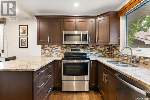 344 Habkirk Drive, Regina, SK - Indoor Photo Showing Kitchen With Stainless Steel Kitchen With Double Sink With Upgraded Kitchen