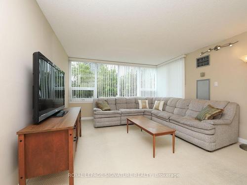 303-55 Skymark Dr, Toronto, ON - Indoor Photo Showing Living Room