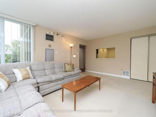 303-55 Skymark Dr, Toronto, ON - Indoor Photo Showing Living Room