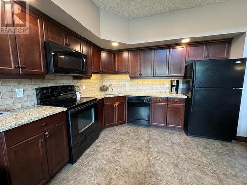 500 Bighorn Boulevard Unit# 533B, Radium Hot Springs, BC - Indoor Photo Showing Kitchen With Double Sink