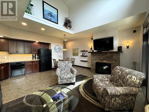 500 Bighorn Boulevard Unit# 533B, Radium Hot Springs, BC - Indoor With Fireplace