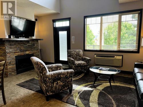 500 Bighorn Boulevard Unit# 533B, Radium Hot Springs, BC - Indoor Photo Showing Living Room With Fireplace