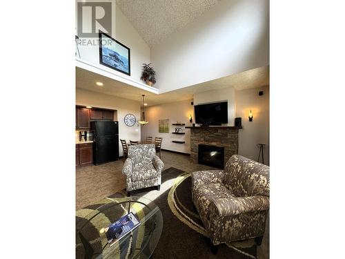 500 Bighorn Boulevard Unit# 533B, Radium Hot Springs, BC - Indoor With Fireplace