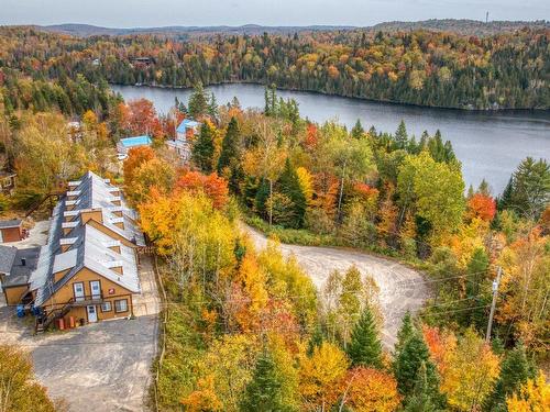 Photo aÃ©rienne - 54  - 56 Ch. D'Entrelacs, Sainte-Marguerite-Du-Lac-Masson, QC - Outdoor With Body Of Water With View