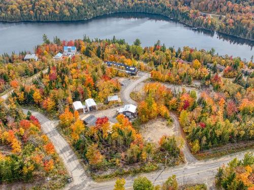 Aerial photo - 54  - 56 Ch. D'Entrelacs, Sainte-Marguerite-Du-Lac-Masson, QC - Outdoor With Body Of Water With View