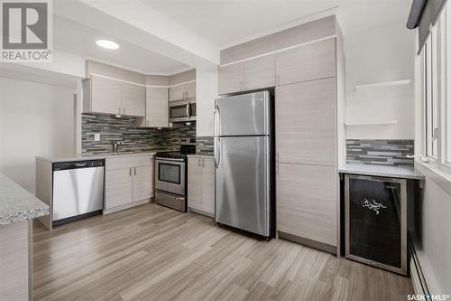 2004 320 5Th Avenue N, Saskatoon, SK - Indoor Photo Showing Kitchen With Stainless Steel Kitchen With Upgraded Kitchen