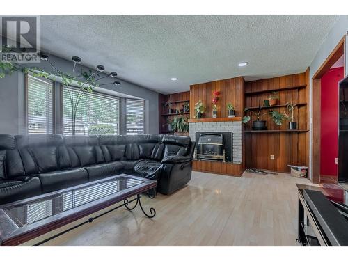 3904 Bellamy Road, Prince George, BC - Indoor Photo Showing Living Room With Fireplace