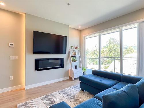 512-967 Whirlaway Cres, Langford, BC - Indoor Photo Showing Living Room With Fireplace