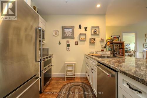 407 - 58 Glenelg Street W, Kawartha Lakes, ON - Indoor Photo Showing Kitchen With Stainless Steel Kitchen