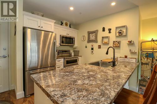 407 - 58 Glenelg Street W, Kawartha Lakes, ON - Indoor Photo Showing Kitchen With Stainless Steel Kitchen With Upgraded Kitchen