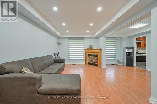 16 Huronia Court S, Brampton, ON - Indoor Photo Showing Living Room With Fireplace