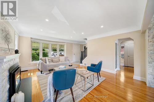 55 East 13Th Street, Hamilton, ON - Indoor Photo Showing Living Room With Fireplace