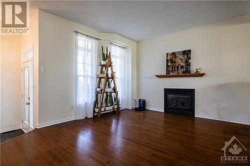 122 Streamside Crescent, Ottawa, ON - Indoor Photo Showing Living Room With Fireplace