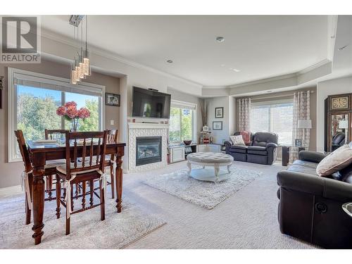 277 Yorkton Avenue Unit# 211, Penticton, BC - Indoor Photo Showing Living Room With Fireplace