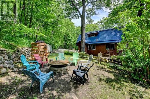 Fire pit for unlimited "Smores" - 2589 Calabogie Road, Calabogie, ON - Outdoor With Deck Patio Veranda