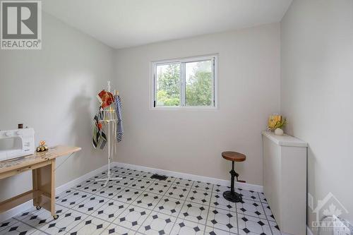 Bedroom/Laundry - 7139 Mitch Owens Road, Ottawa, ON - Indoor Photo Showing Bedroom