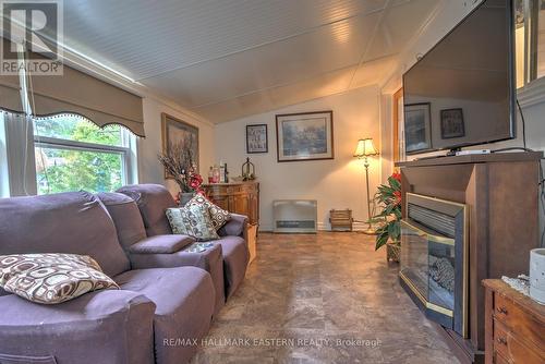 57 Circle Drive, Kawartha Lakes, ON - Indoor Photo Showing Living Room With Fireplace