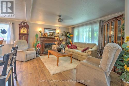 57 Circle Drive, Kawartha Lakes, ON - Indoor Photo Showing Living Room With Fireplace