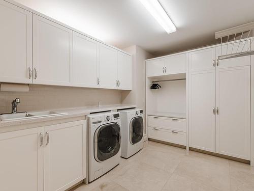 Salle de lavage - 2 Cours St-Lawrence, Dorval, QC - Indoor Photo Showing Laundry Room