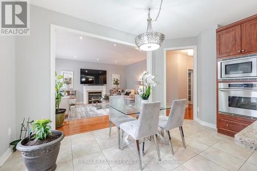 8 Levida Street, Brampton, ON - Indoor Photo Showing Dining Room With Fireplace