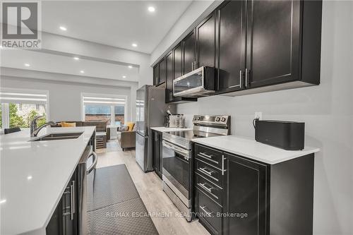 32 - 187 Wilson Street W, Hamilton, ON - Indoor Photo Showing Kitchen With Double Sink With Upgraded Kitchen