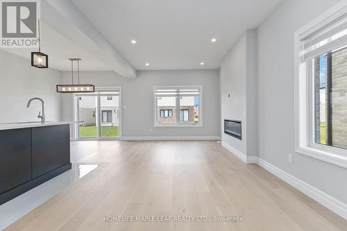 3869 Auckland Avenue, London, ON - Indoor Photo Showing Other Room With Fireplace