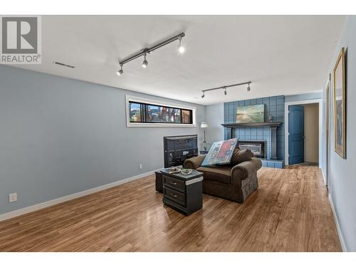 3381 Mcmurchie Road, West Kelowna, BC - Indoor Photo Showing Other Room With Fireplace