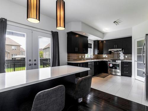 Kitchen - 7925 Rue De Lausanne, Brossard, QC - Indoor Photo Showing Kitchen With Double Sink With Upgraded Kitchen