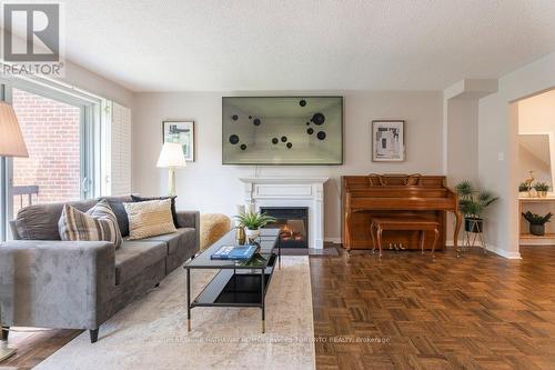 2 Farina Mill Way, Toronto, ON - Indoor Photo Showing Living Room With Fireplace