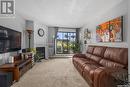 #103 315 Kingsmere Boulevard, Saskatoon, SK  - Indoor Photo Showing Living Room With Fireplace 