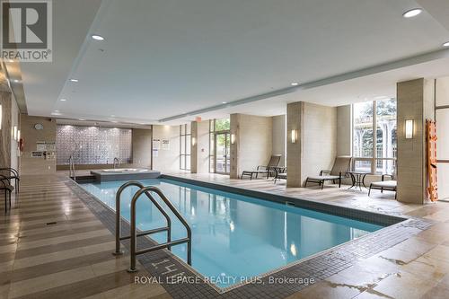 603 - 2470 Prince Michael Drive, Oakville, ON - Indoor Photo Showing Other Room With In Ground Pool