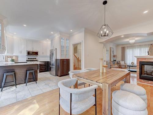 Kitchen - 199 Av. De Deauville, Candiac, QC - Indoor With Fireplace