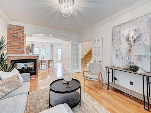 Living room - 199 Av. De Deauville, Candiac, QC - Indoor Photo Showing Living Room With Fireplace