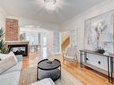 Salon - 199 Av. De Deauville, Candiac, QC  - Indoor Photo Showing Living Room With Fireplace 