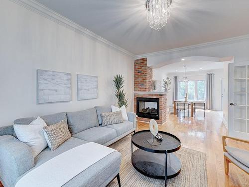 Living room - 199 Av. De Deauville, Candiac, QC - Indoor Photo Showing Living Room With Fireplace