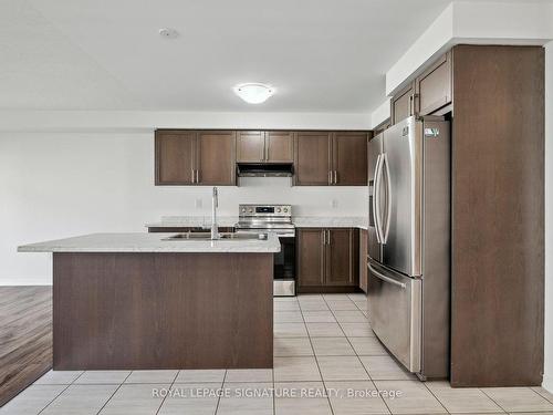 8779 Sourgum Ave, Niagara Falls, ON - Indoor Photo Showing Kitchen With Stainless Steel Kitchen With Double Sink