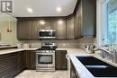 1570 Westbrook Drive, Peterborough (Monaghan), ON  - Indoor Photo Showing Kitchen With Double Sink With Upgraded Kitchen 