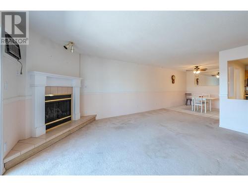 374 Winnipeg Street Unit# 307, Penticton, BC - Indoor Photo Showing Living Room With Fireplace