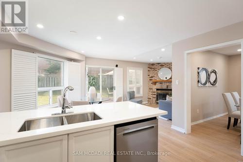 4556 Donegal Drive, Mississauga, ON - Indoor Photo Showing Kitchen With Fireplace With Double Sink