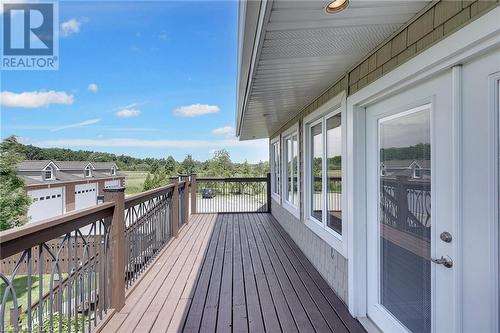 Bright and airy with vaulted ceilings, private balcony, and its own washroom—ideal as a home office, gym, or guest suite. - 551 Darby Road, Welland, ON - Outdoor With Deck Patio Veranda With Exterior