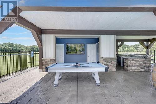 Private access from the Primary bedroom to the covered hot tub deck overlooking the backyard outdoor space. - 551 Darby Road, Welland, ON - Outdoor With Exterior