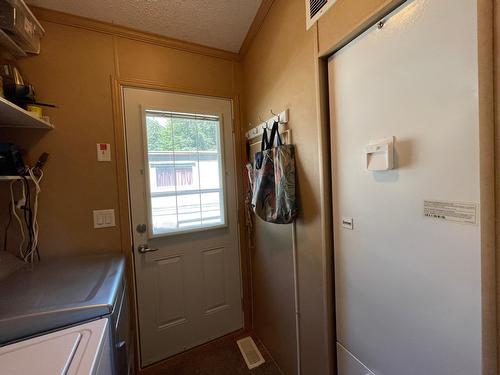 27 - 2905 Lower Six Mile Road, Nelson, BC - Indoor Photo Showing Laundry Room