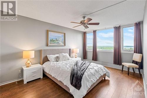 Primary Bedroom with views, a double closet and a 2 peice ensuite! - 265 Poulin Avenue Unit#1411, Ottawa, ON - Indoor Photo Showing Bedroom