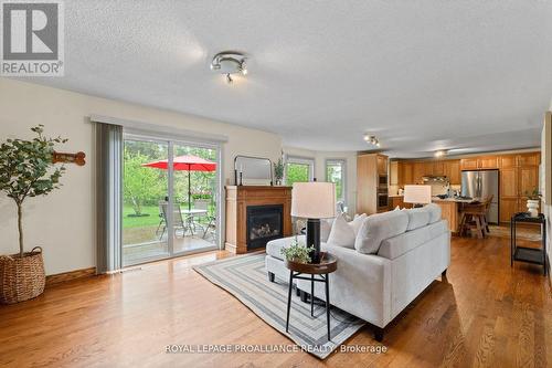 3 Slalom Drive, Kawartha Lakes, ON - Indoor Photo Showing Living Room With Fireplace