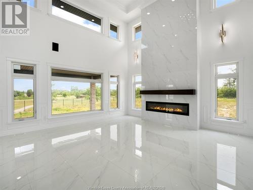 312 Benson Court, Amherstburg, ON - Indoor Photo Showing Other Room With Fireplace