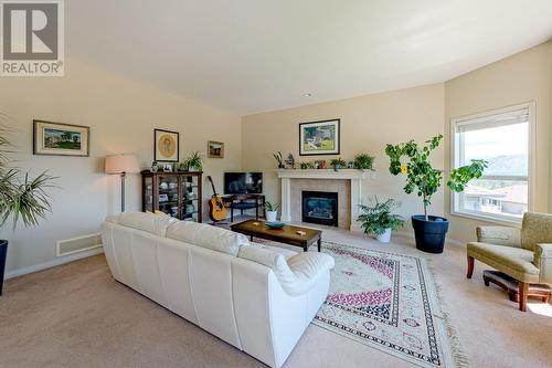 2250 Shannon Hills Place, West Kelowna, BC - Indoor Photo Showing Living Room With Fireplace