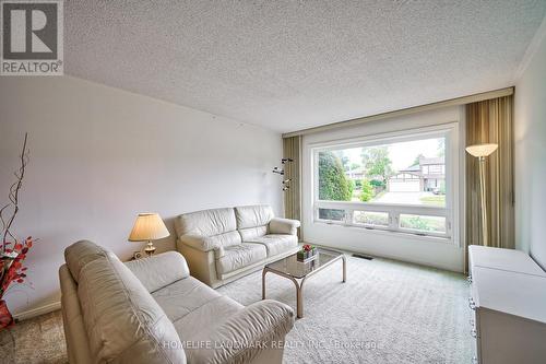 1076 Huntingwood Drive, Toronto, ON - Indoor Photo Showing Living Room