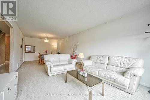 1076 Huntingwood Drive, Toronto, ON - Indoor Photo Showing Living Room