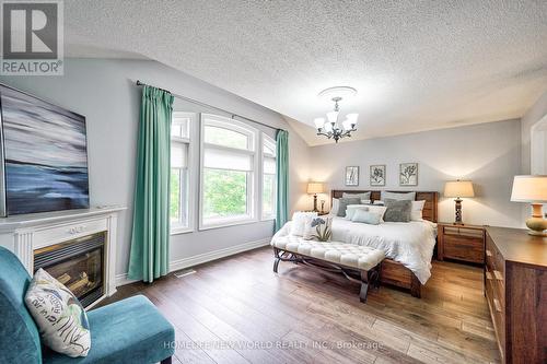 2297 Carpenters Circle, Oakville, ON - Indoor Photo Showing Bedroom With Fireplace